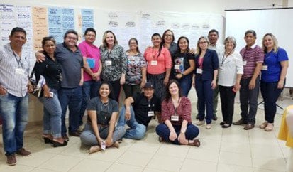 a group of people posing for a photo