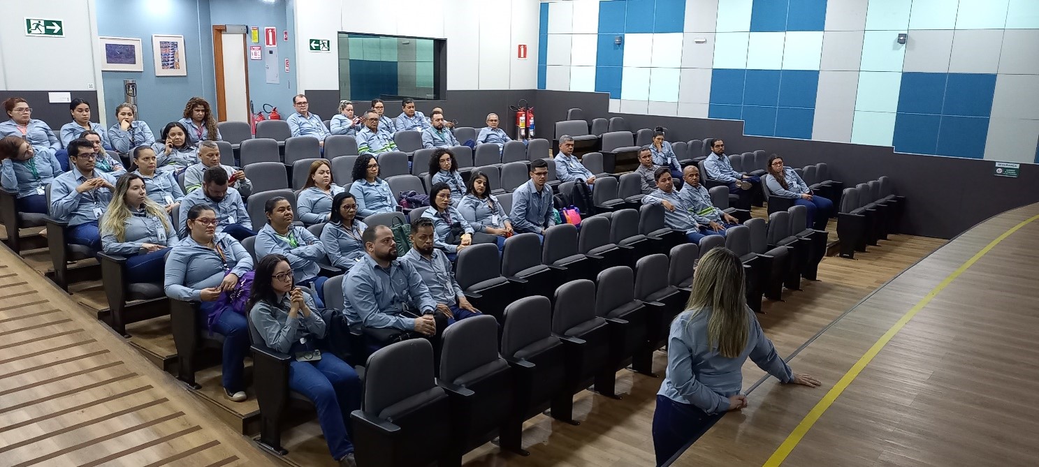 a group of people sitting in a room