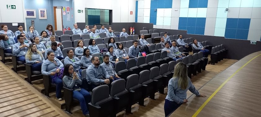 a group of people sitting in a room