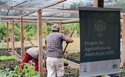 a man and a woman in a garden