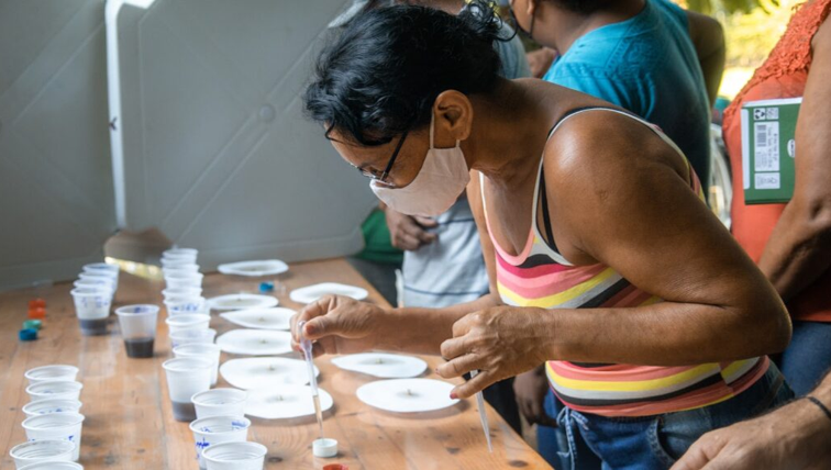 a few young boys painting