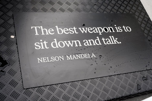 Engraved on the bench is Mandela's quote; "the best weapon is to sit down and talk."