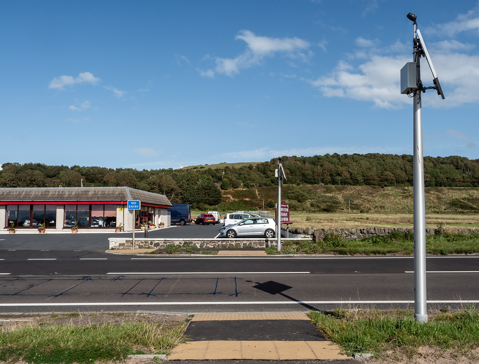 a parking lot with cars