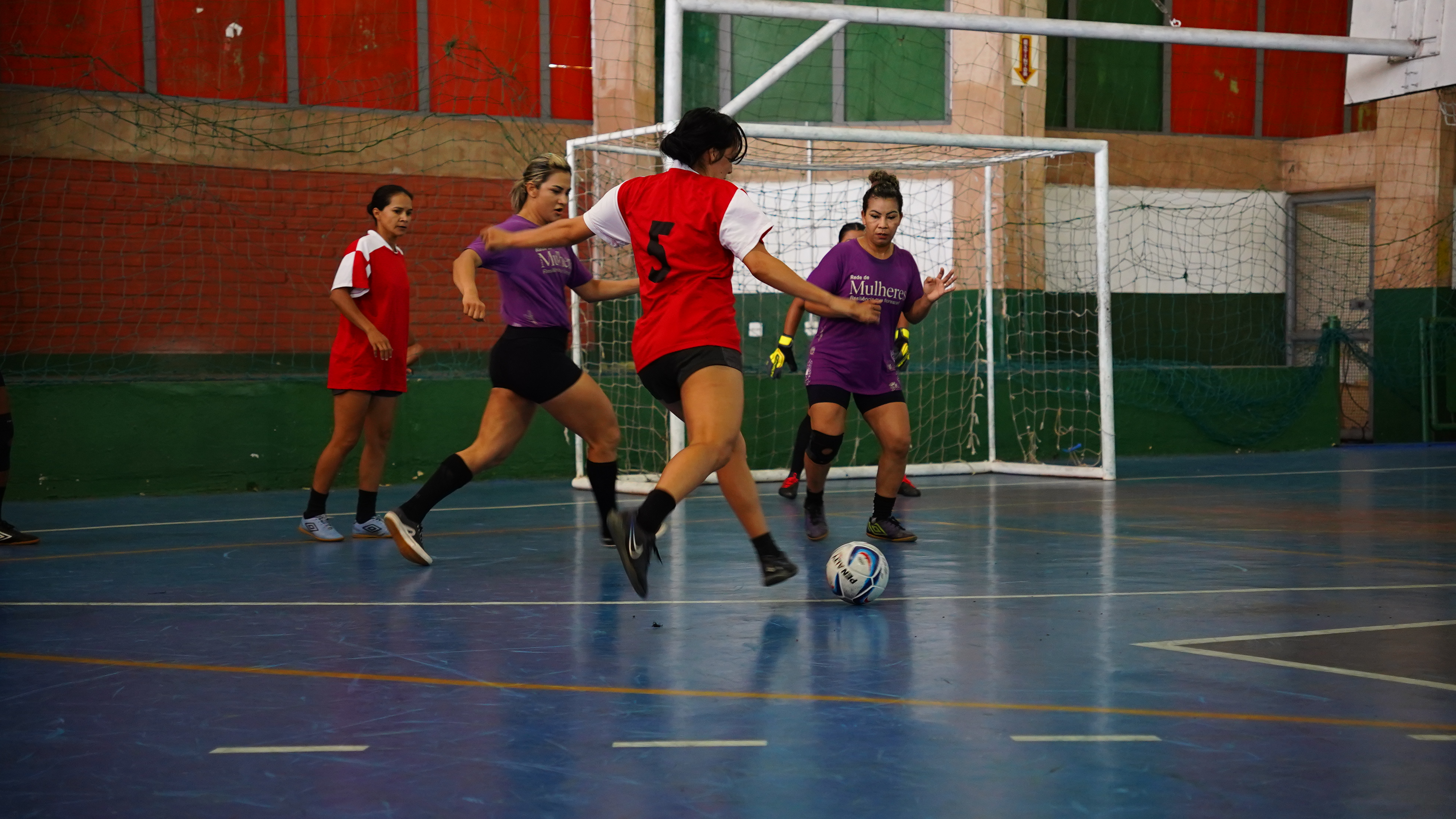 a group of women playing football