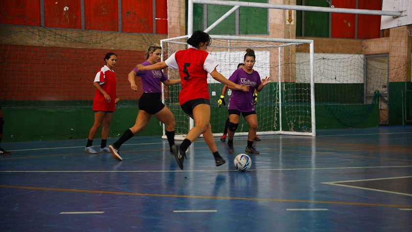a group of women playing football