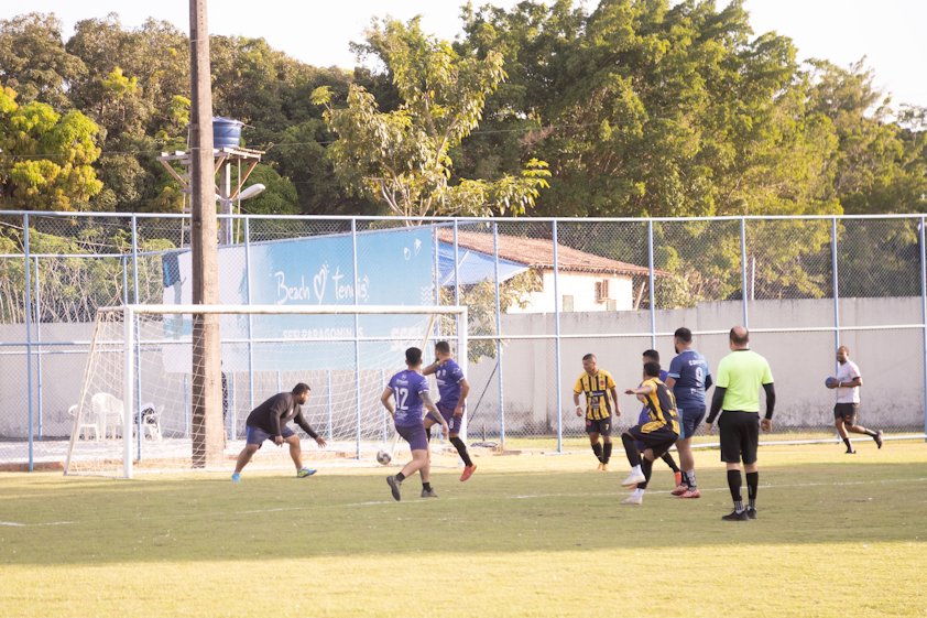 a group of men playing football