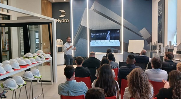 a person giving a presentation to a group of people