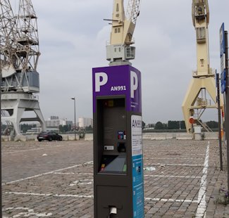 a parking meter in a city