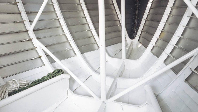 a close-up of a white staircase