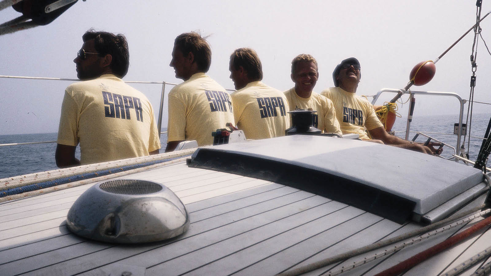 a group of men on a boat