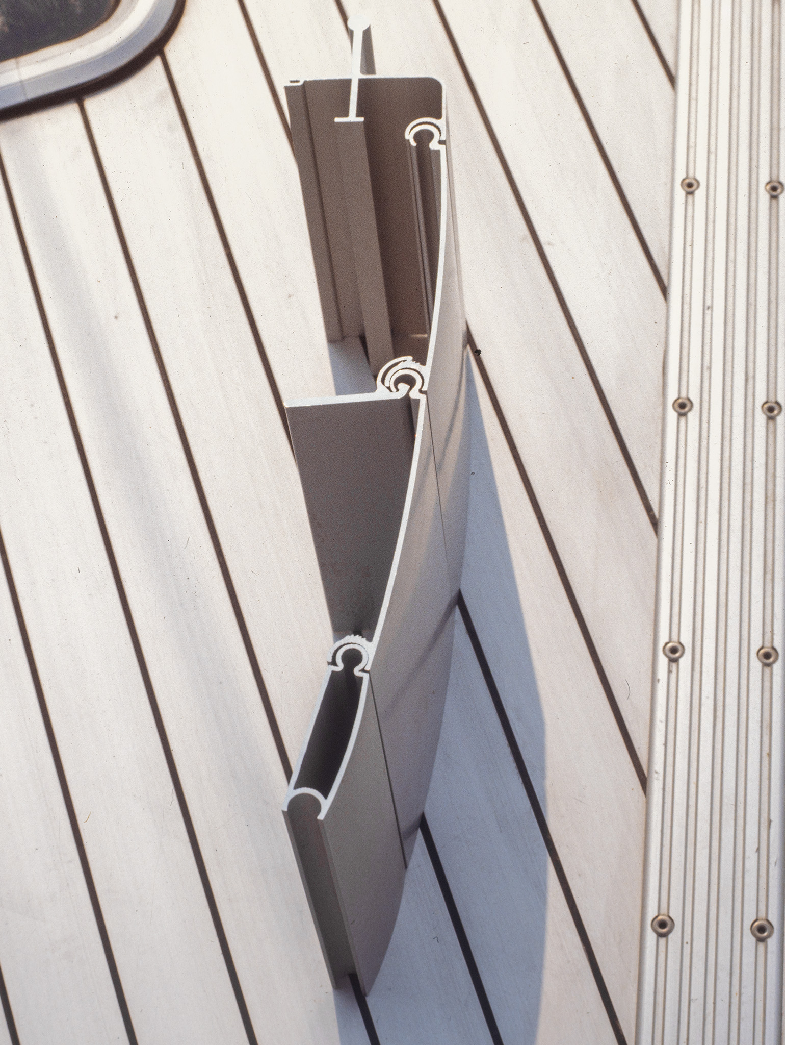 a metal piece of metal on a wall