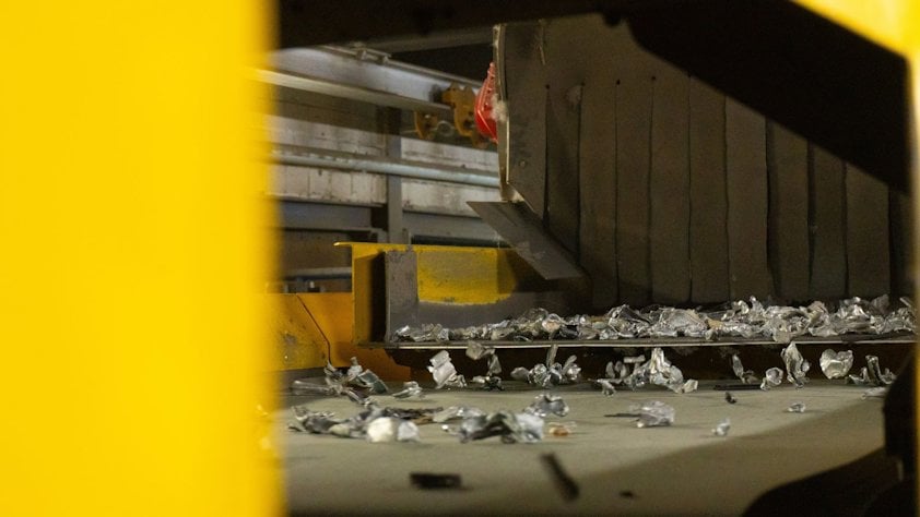 a dumpster with trash in it