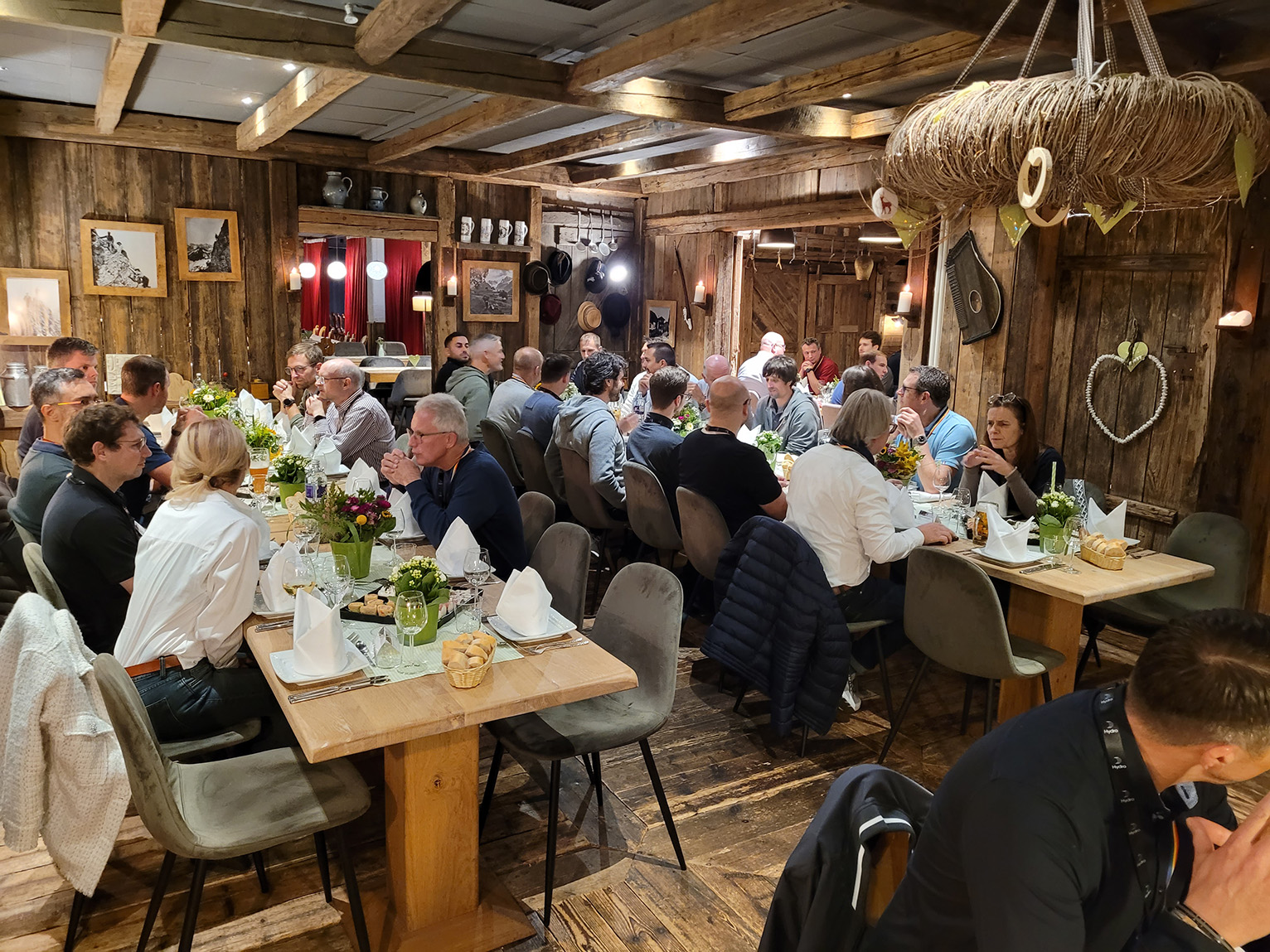 a group of people sitting at tables
