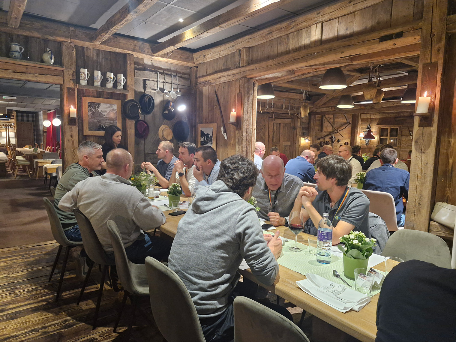 a group of people sitting at tables