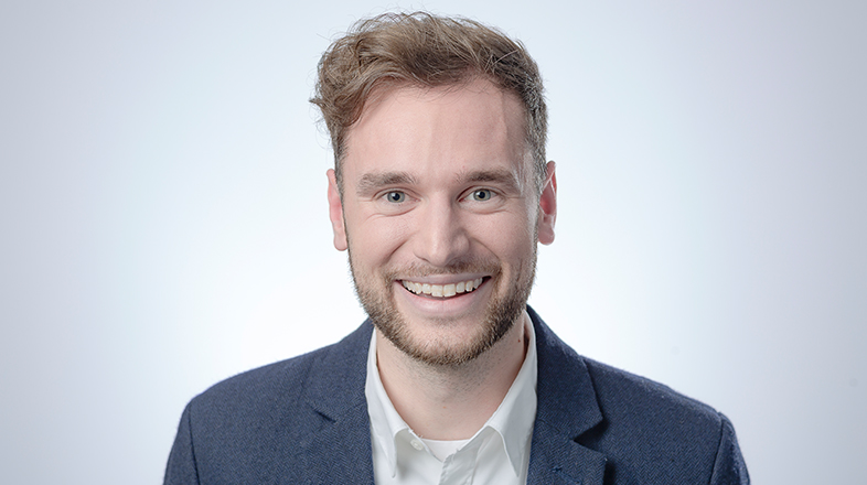 a man smiling for the camera