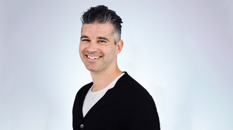 a man smiling for the camera