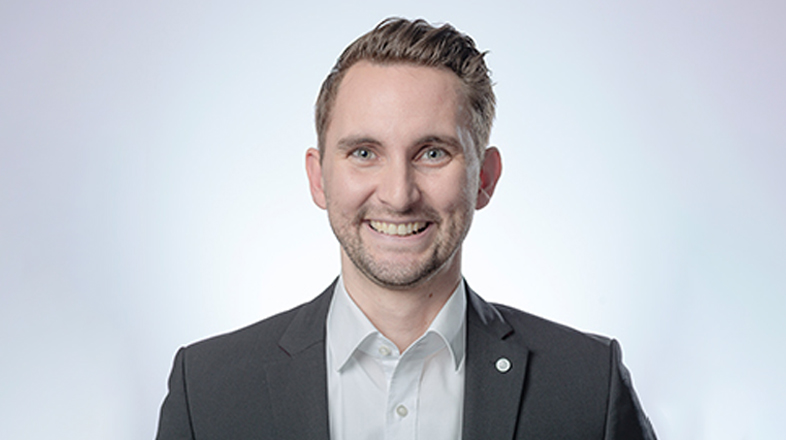 a man smiling for the camera