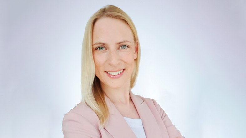 a woman in pink suit