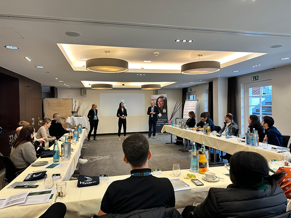 a group of people in a meeting