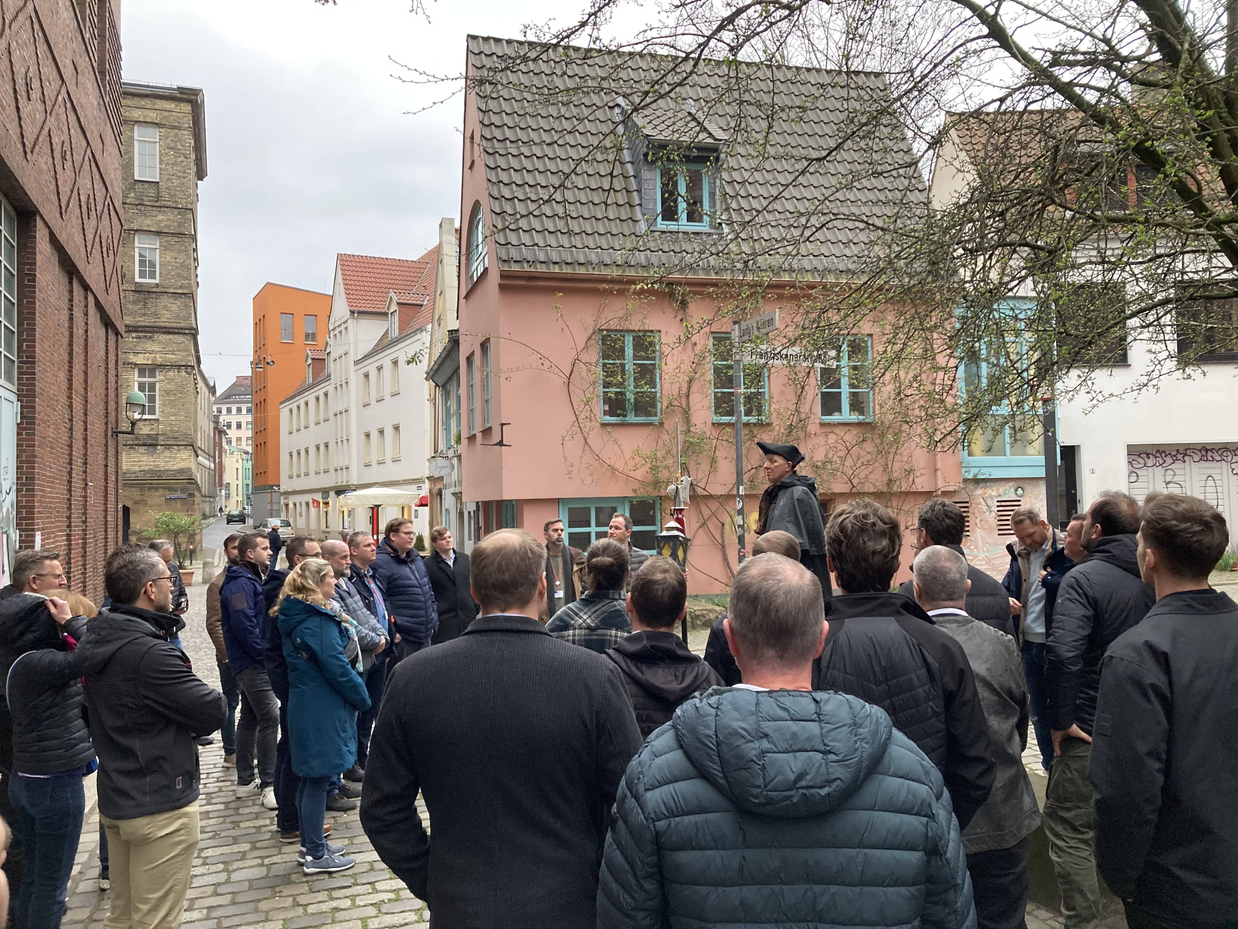 a group of people in a street