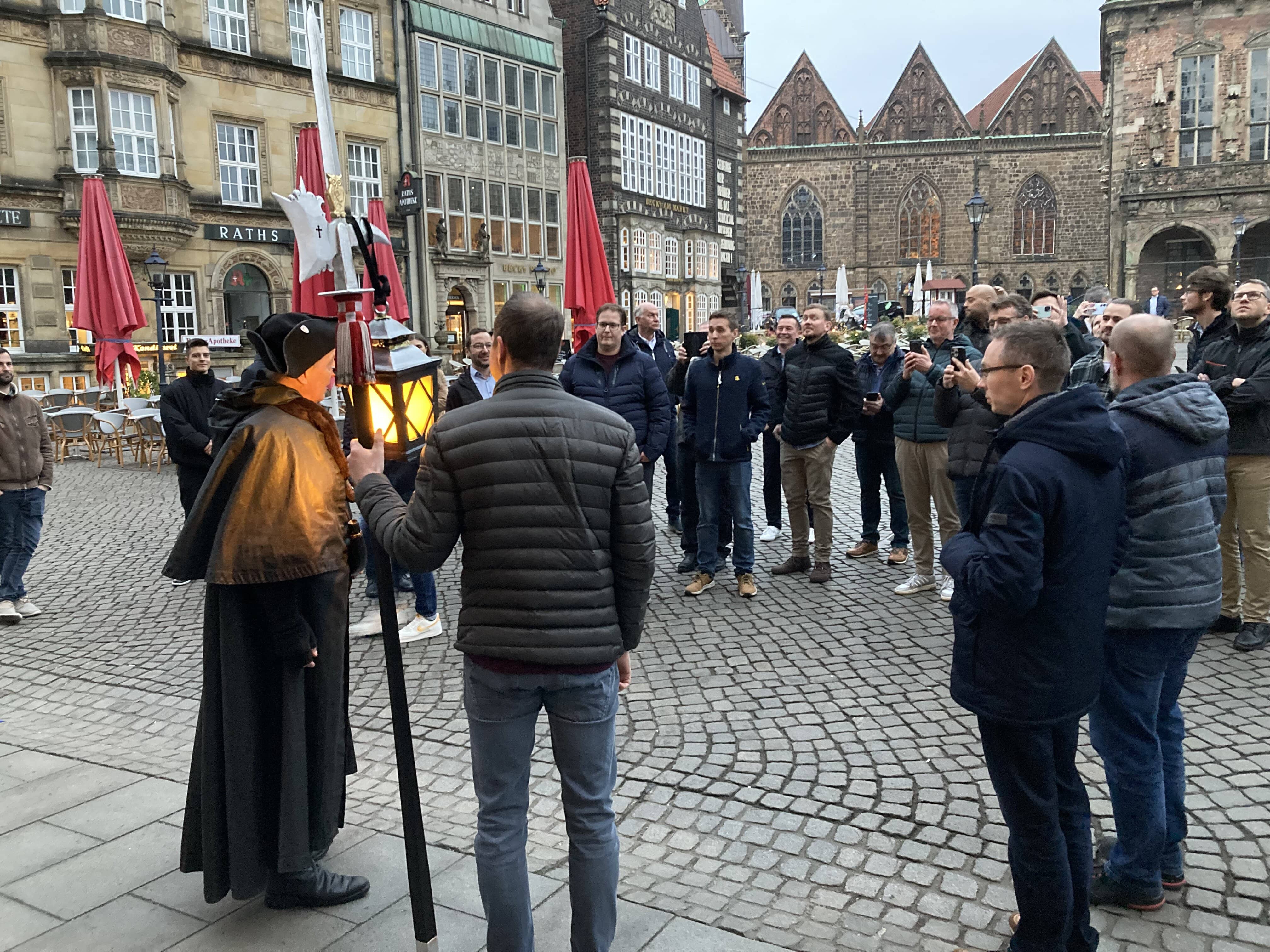 a group of people holding flags