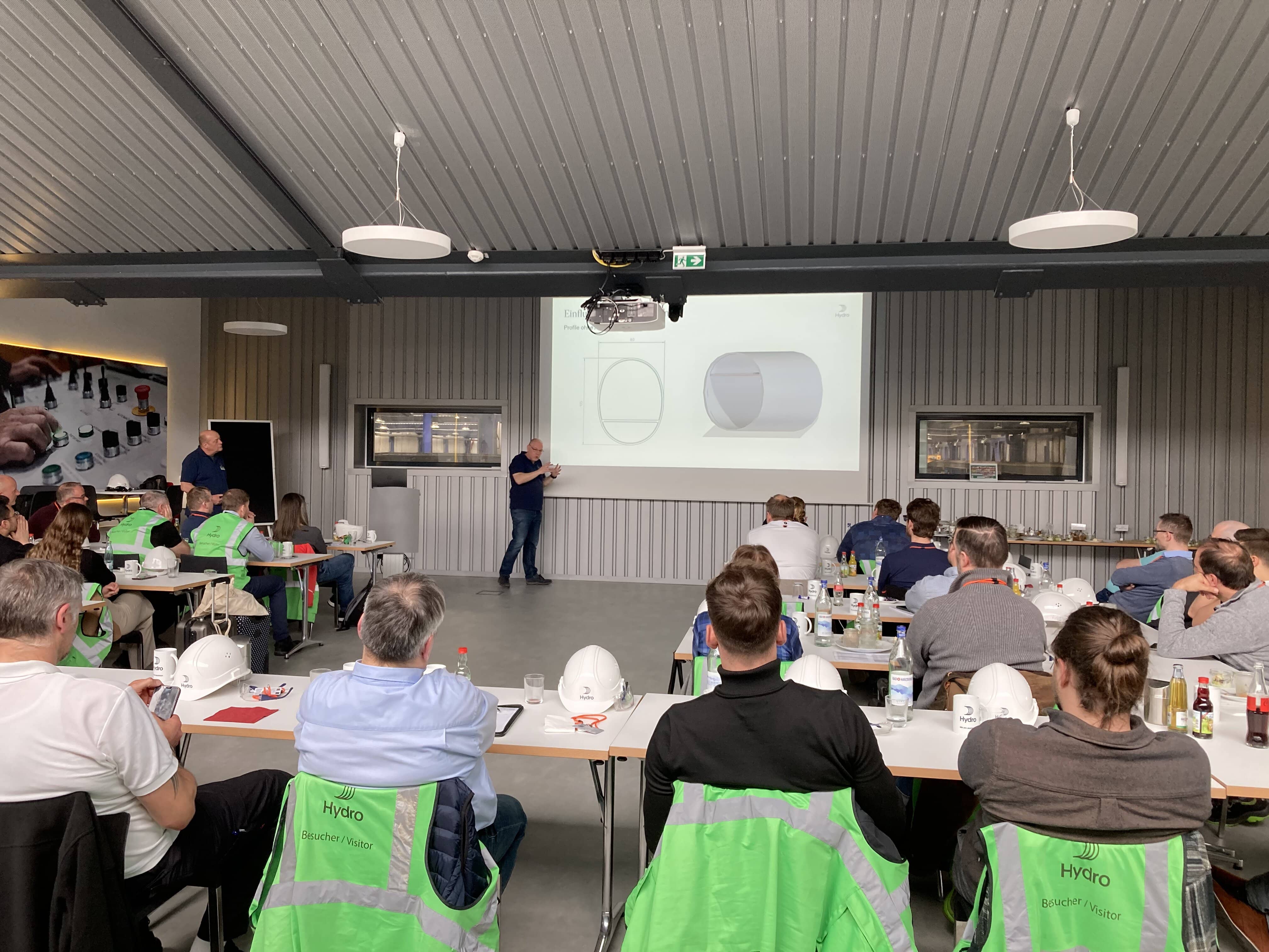 a group of people sitting at tables