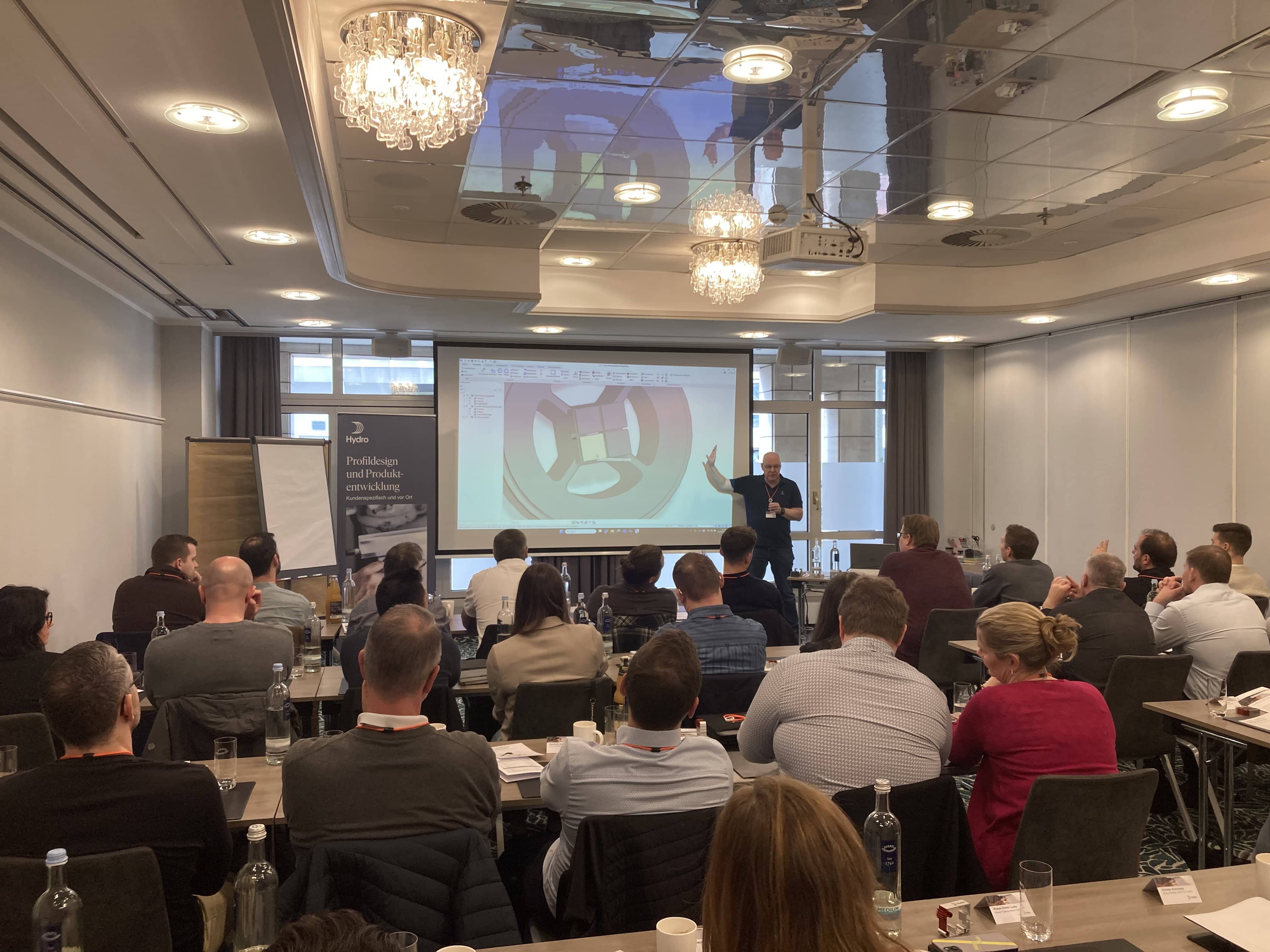 a person giving a presentation to an audience