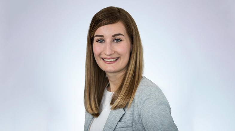 a woman smiling for the camera