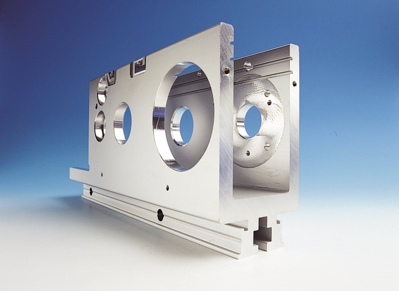 a white machine with blue circles