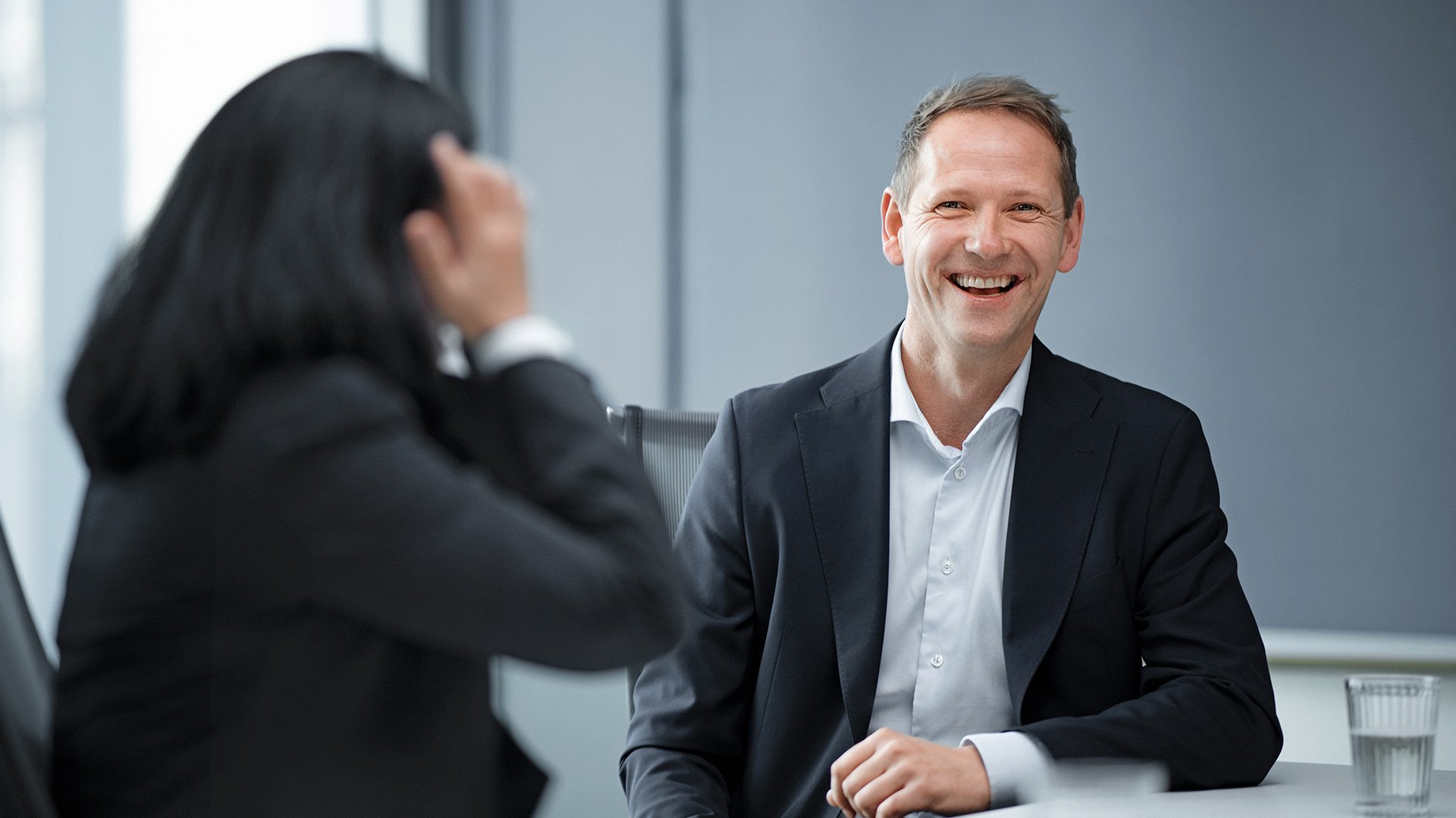 a man and a woman smiling