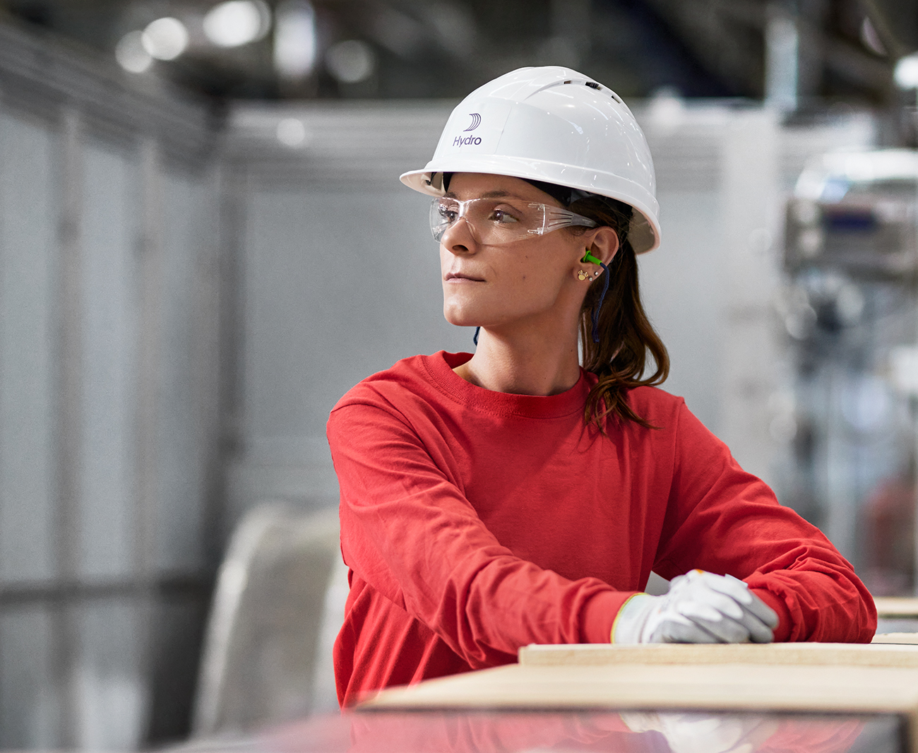 a woman wearing a hard hat