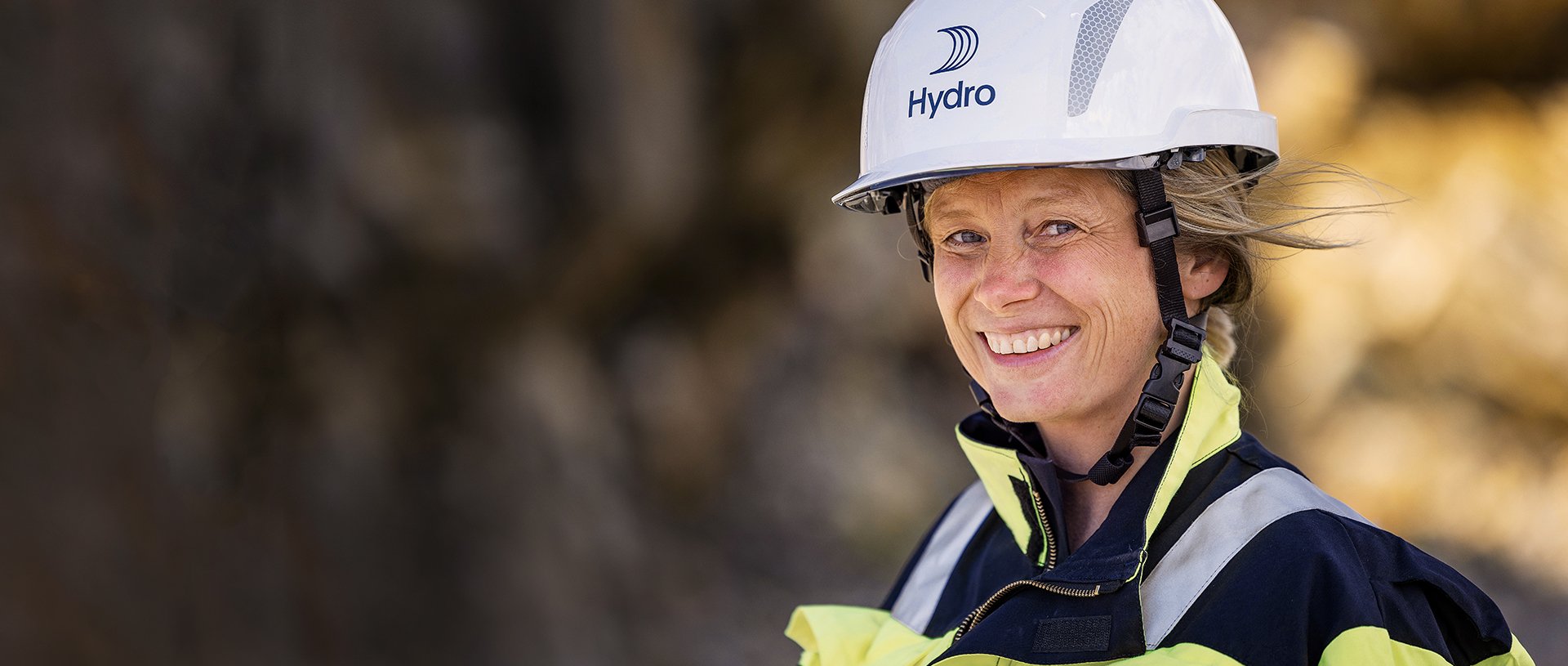 a woman wearing a hard hat