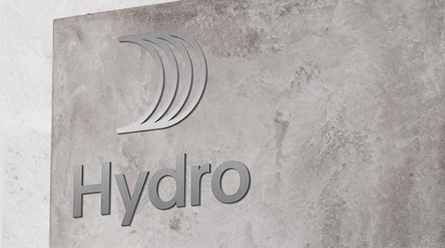 concrete wall with hydro sign in metal