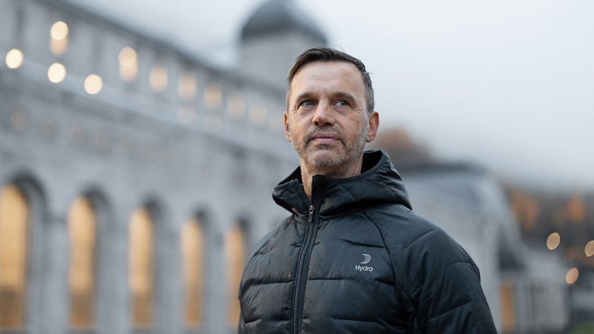 a man in a black jacket