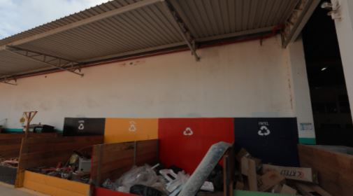 a red and white box on a shelf