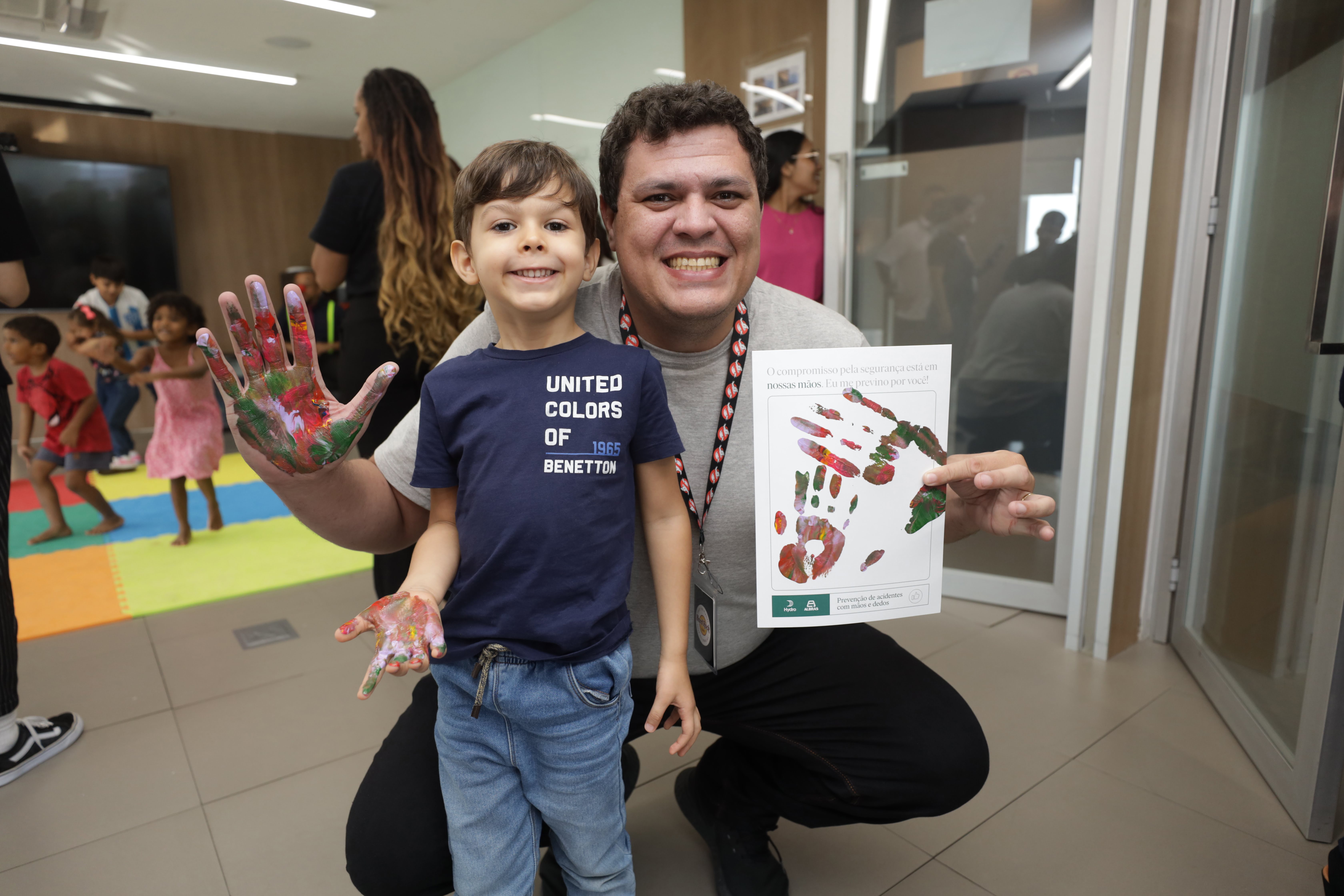 a person and a boy holding a gift box