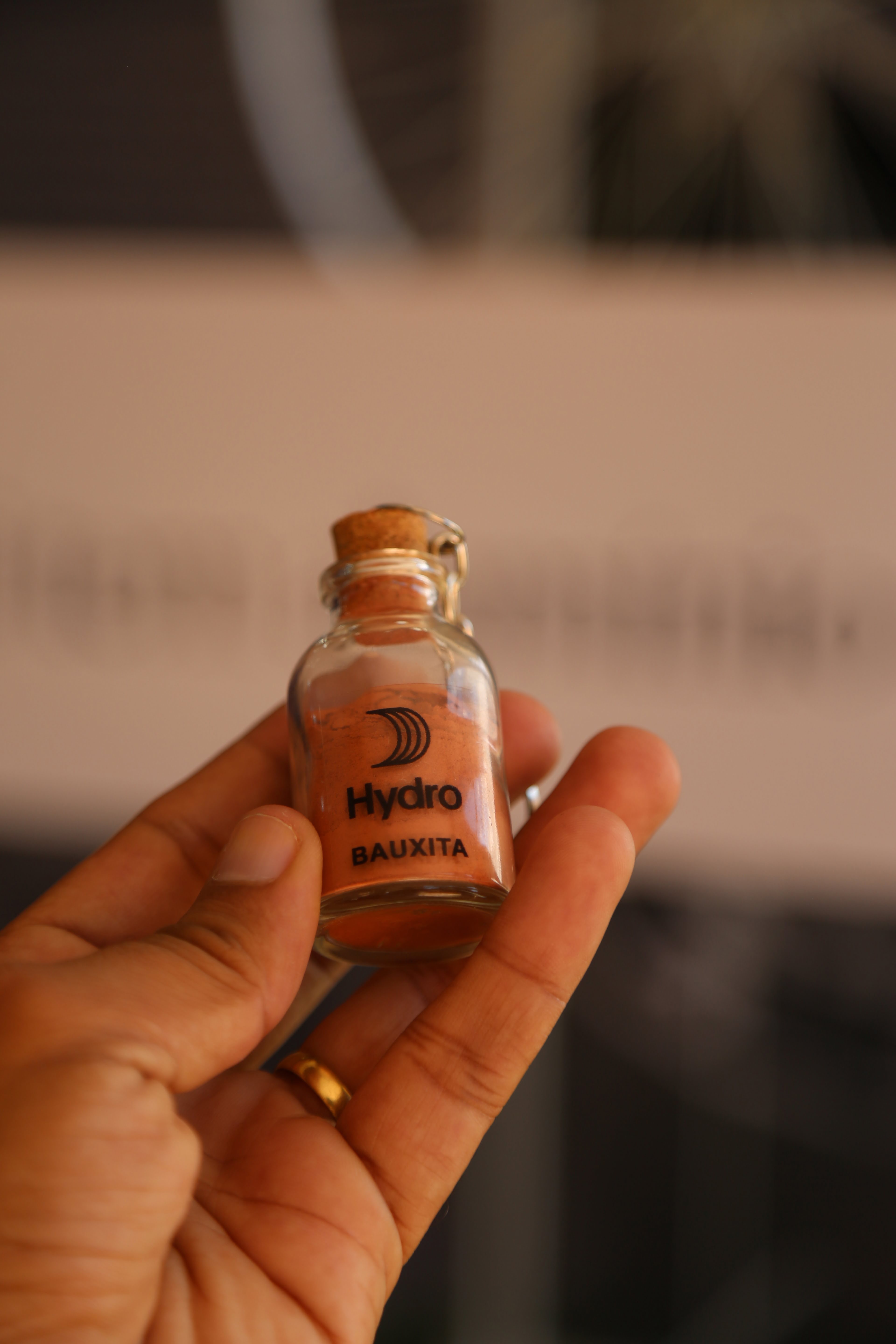 a person holding a bottle