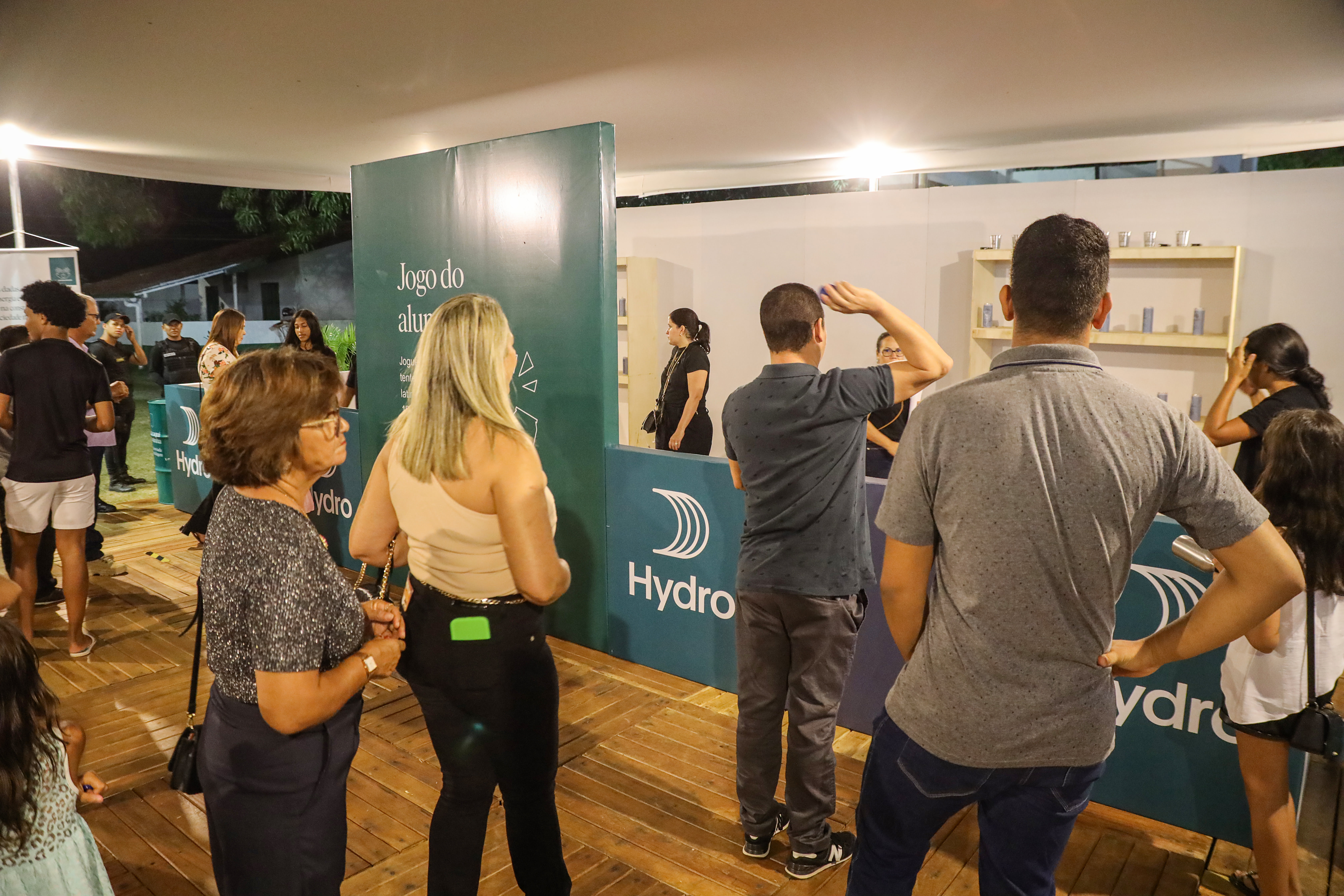 a group of people standing in a room