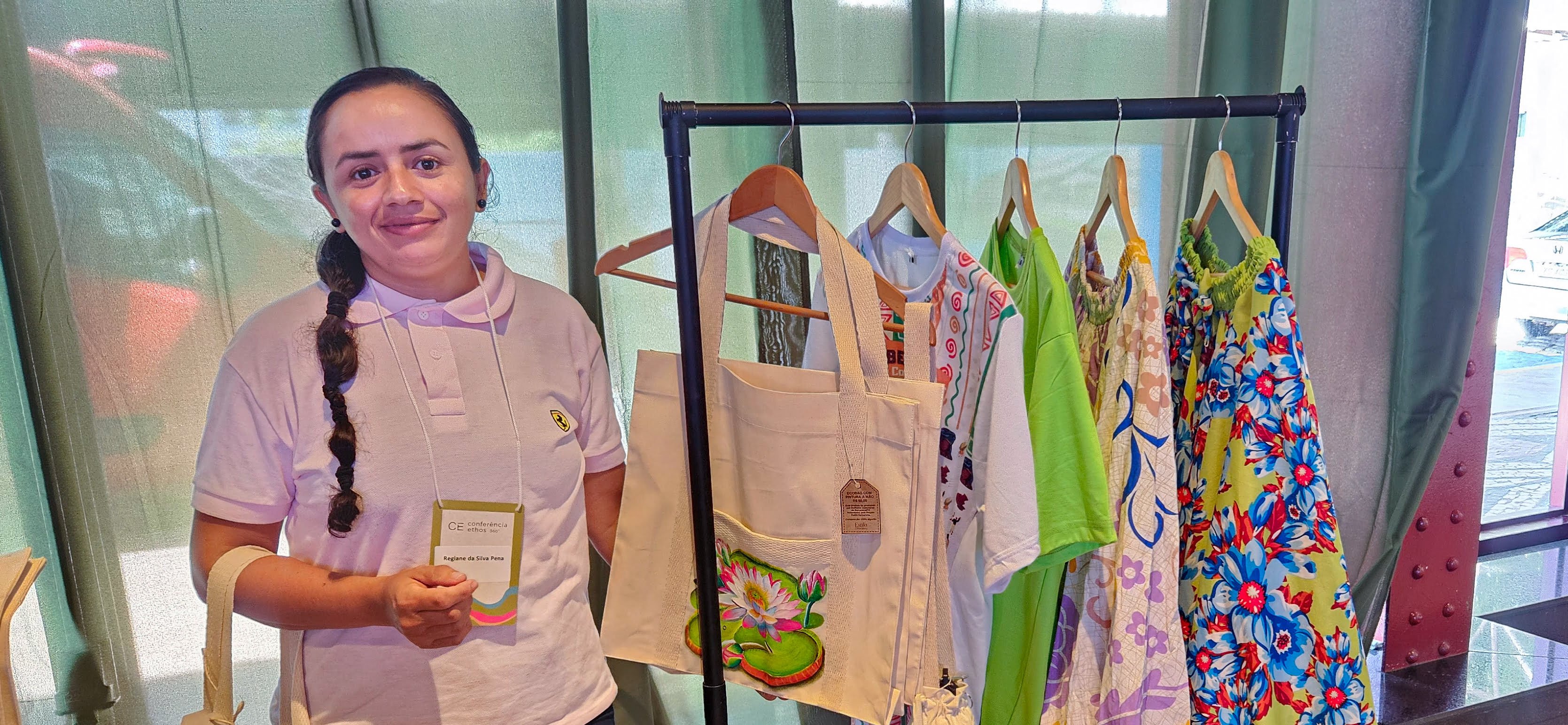 a person holding a bag of clothes