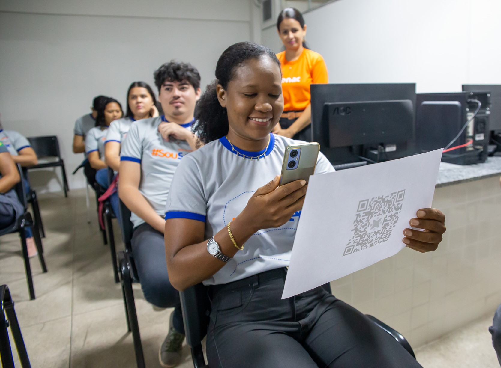 a group of people sitting in chairs