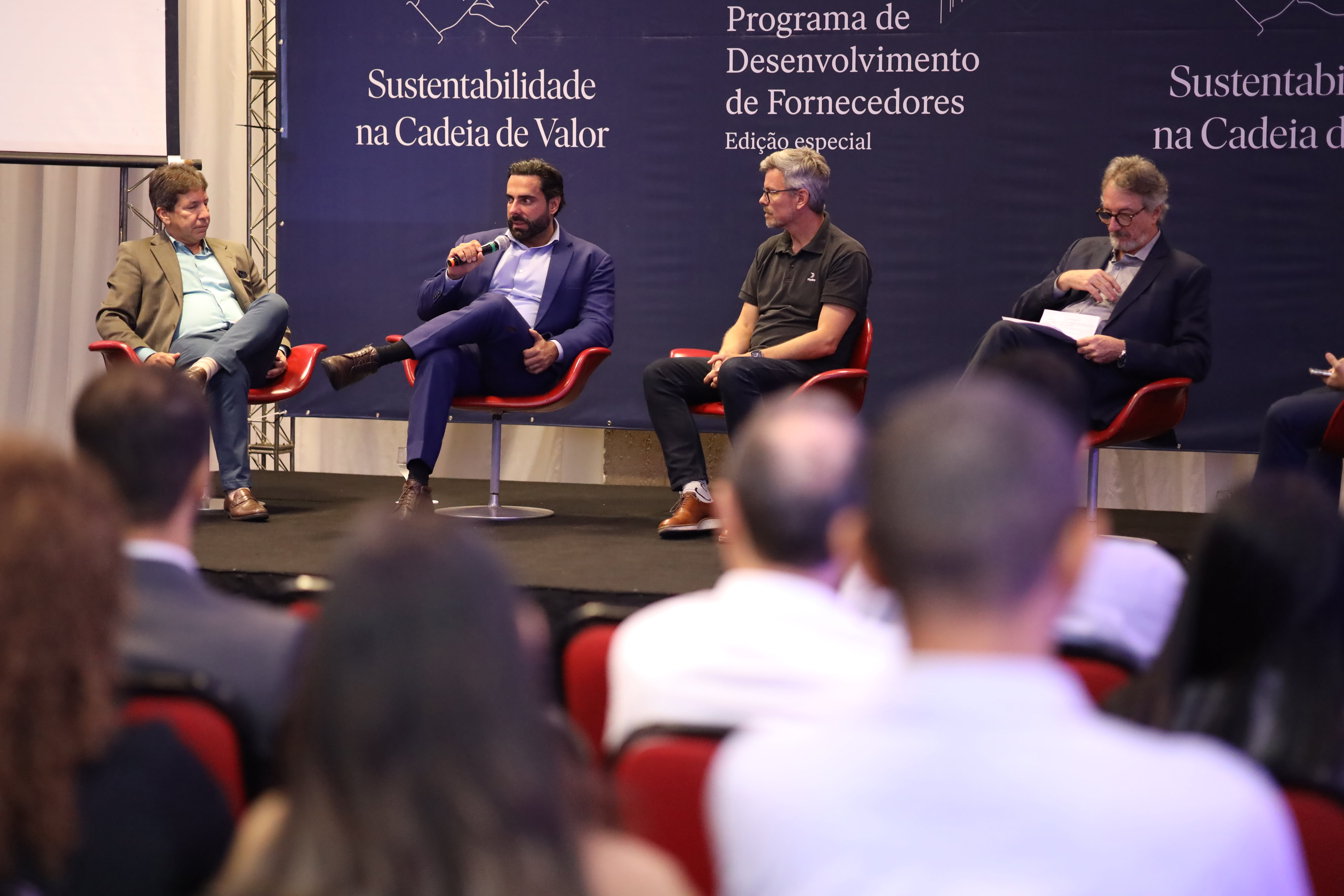 a group of people sitting in chairs