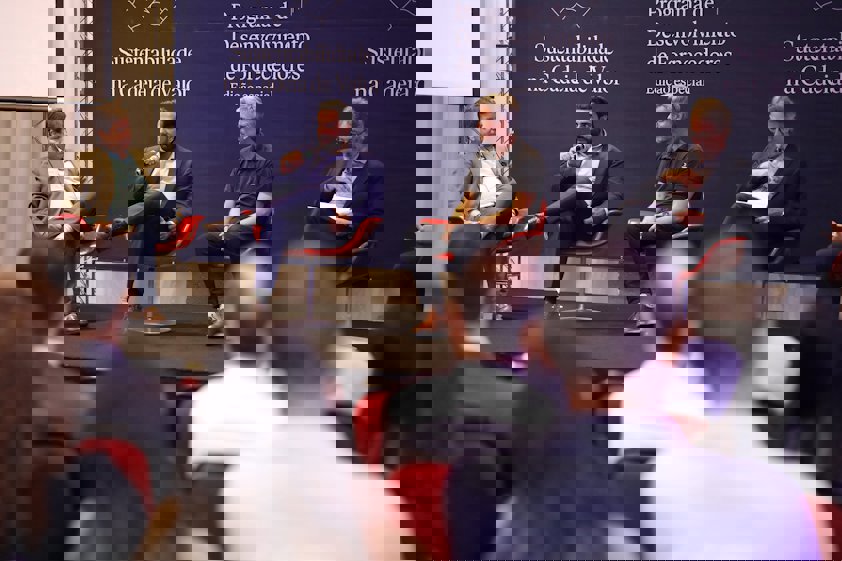 a group of people sitting in chairs