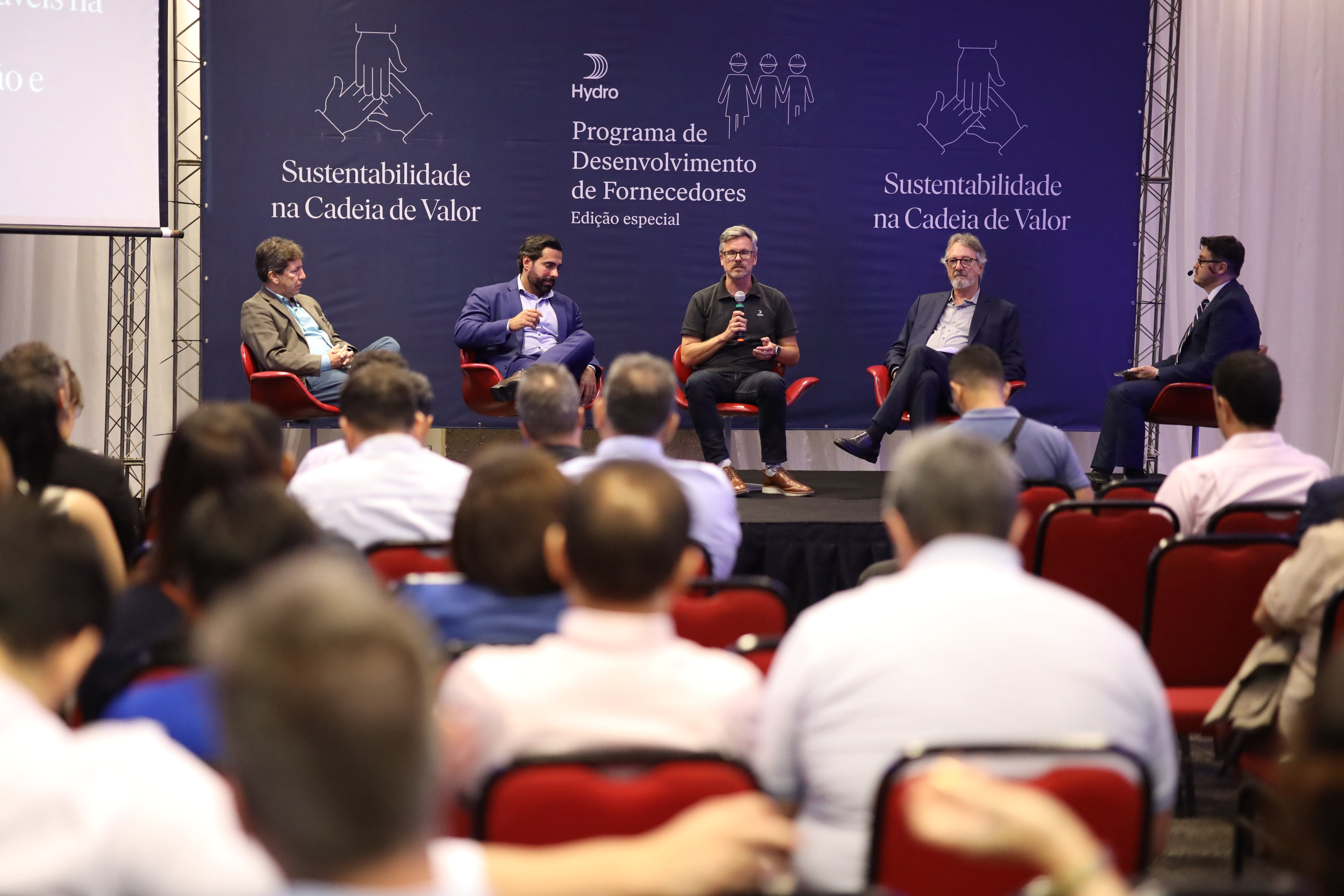 a group of people sitting in chairs