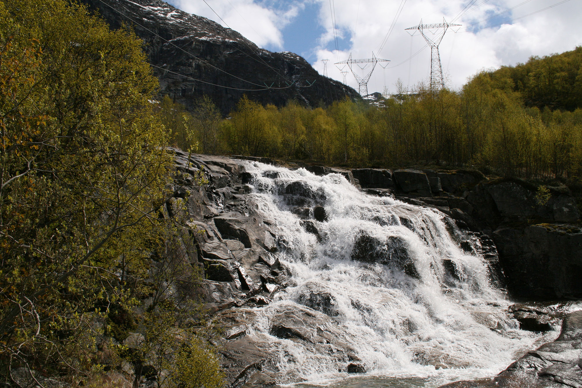 Power lines and water fall