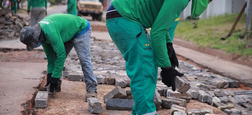 a few men working on a fire