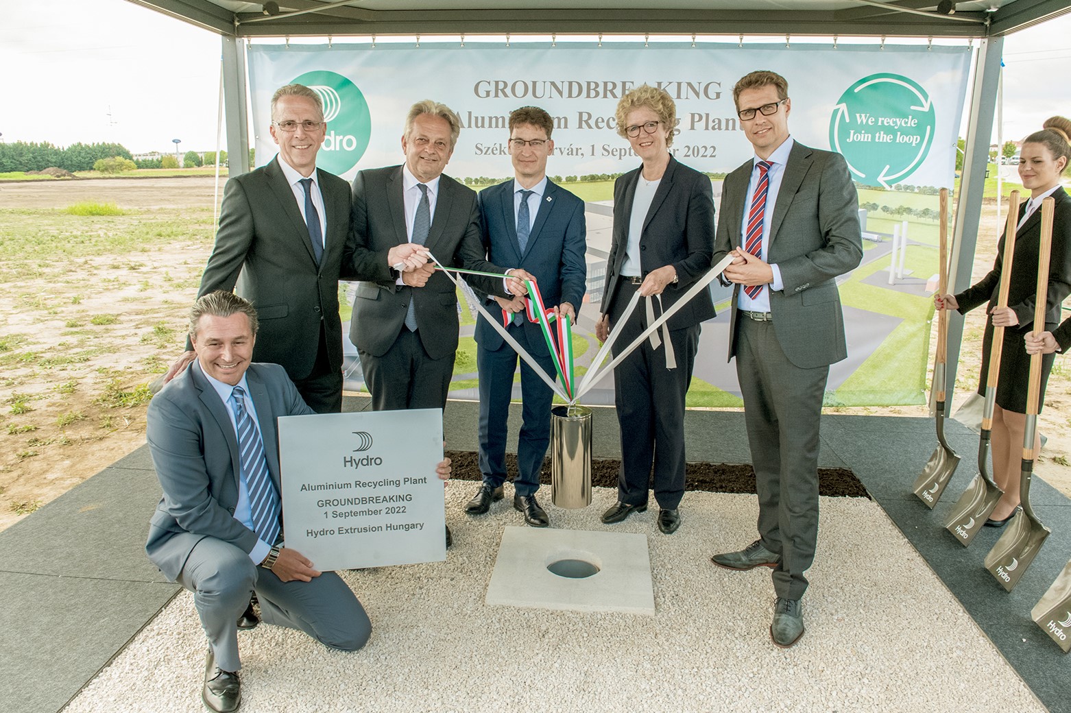 a group of people posing for a photo
