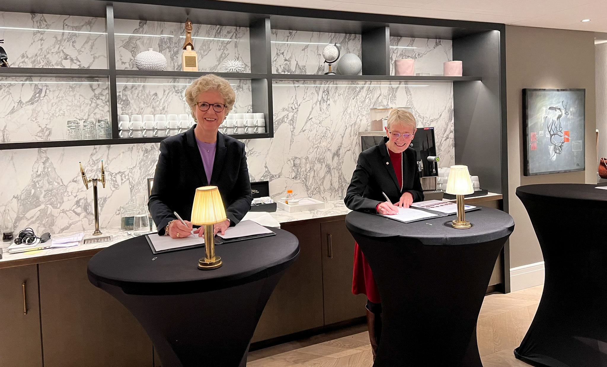 CEO Hilde Merete Aasheim signing the collaboration with NTNU's Chief academic and administrative officer Anne Borg in Trondheim, Norway.