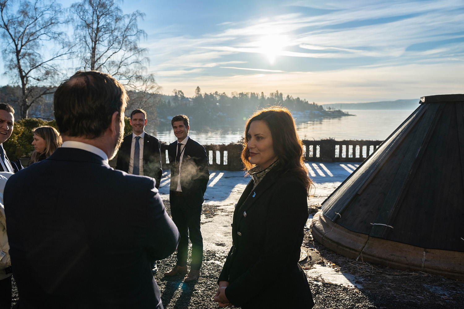 a group of people standing on a dock