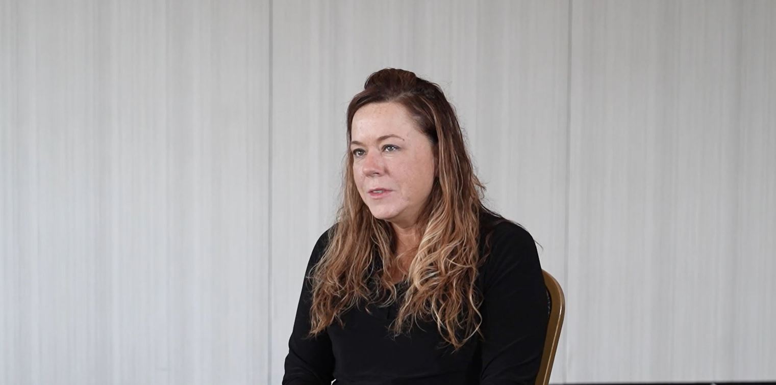 a woman sitting in a chair