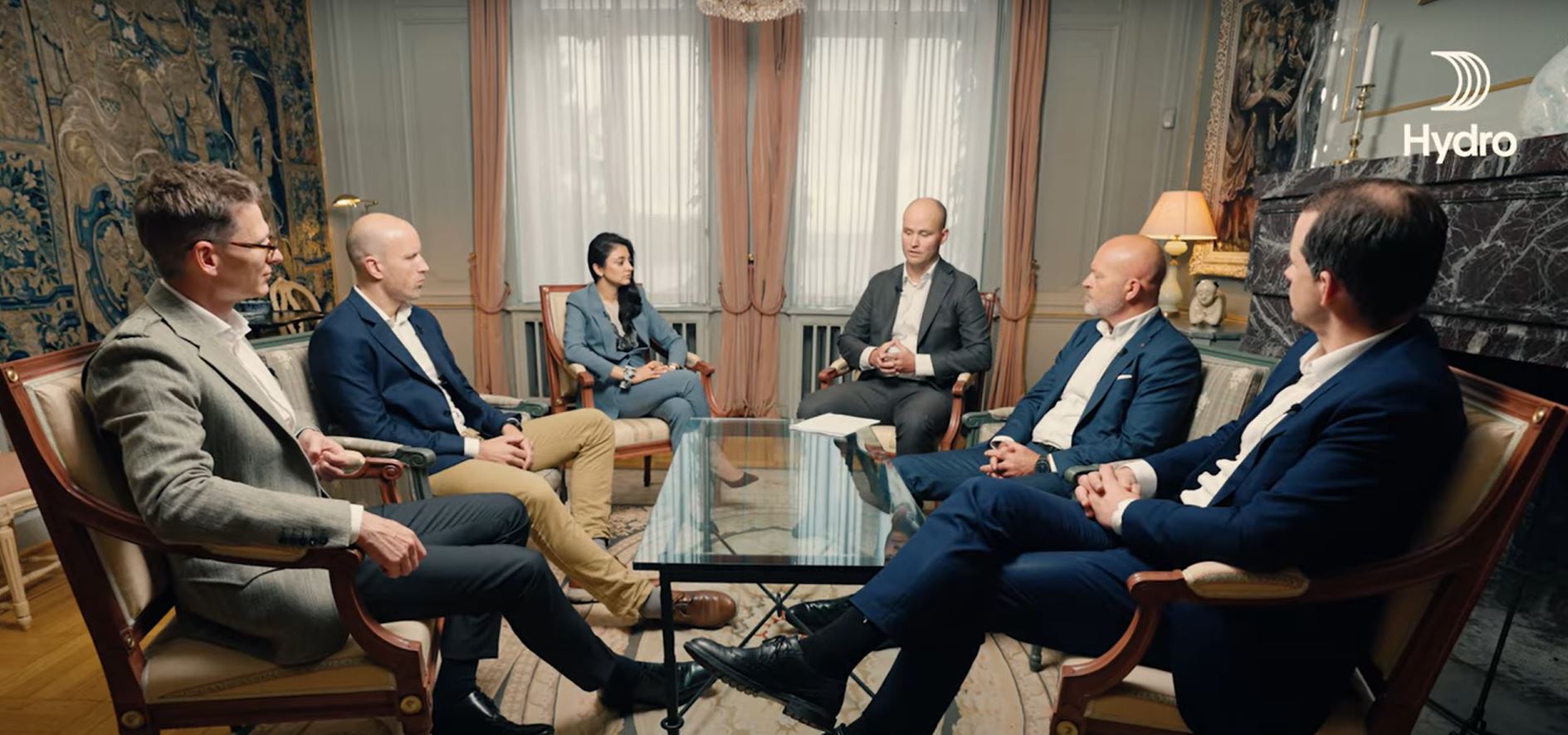 a group of people sitting in chairs